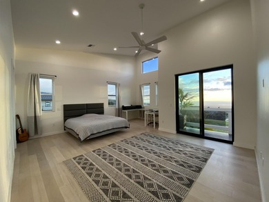 A newly completed 2023 Custom home in the prestigious Kula Io - photo 11