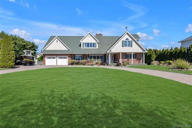 This spectacular expanded ranch sits on a deep waterfront lot - photo 2