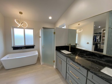 A newly completed 2023 Custom home in the prestigious Kula Io - photo 12