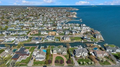 This spectacular expanded ranch sits on a deep waterfront lot - photo 6