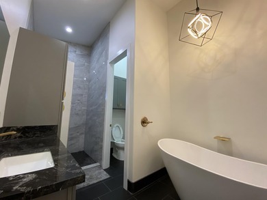 A newly completed 2023 Custom home in the prestigious Kula Io - photo 18