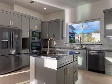 A newly completed 2023 Custom home in the prestigious Kula Io - photo 26