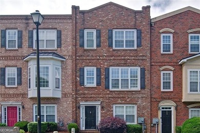 Welcome Home! This lovely 3-bedroom, 2.5 bath brick townhome - photo 1