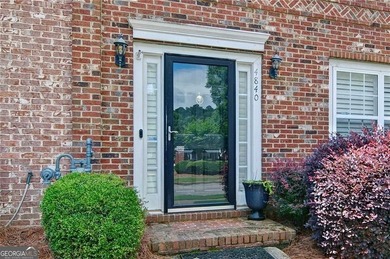 Welcome Home! This lovely 3-bedroom, 2.5 bath brick townhome - photo 4