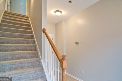 Welcome Home! This lovely 3-bedroom, 2.5 bath brick townhome - photo 6