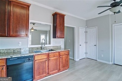 Welcome Home! This lovely 3-bedroom, 2.5 bath brick townhome - photo 7