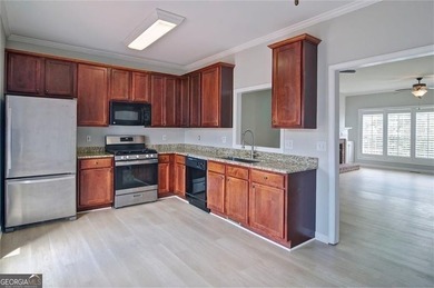 Welcome Home! This lovely 3-bedroom, 2.5 bath brick townhome - photo 8
