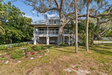 Coastal Key West style home with Gulf water views!  Located on a - photo 3