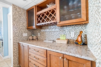 Beautifully updated beach front condo ideally located in the - photo 8