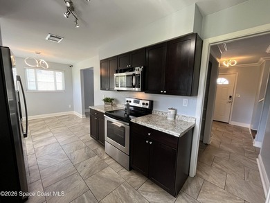 TRI LEVEL HOME on .26 of an acre! 3 Bedroom 2 bath with Living - photo 24