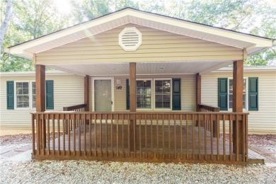 Lake Home For Sale in Fair Play, South Carolina