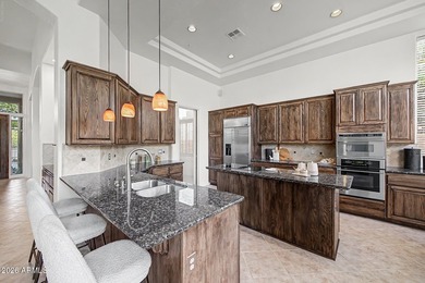 Set on a corner lot in Troon North, this home pairs an attached - photo 17