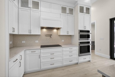 Completely reimagined, this custom-designed, newly rebuilt - photo 16