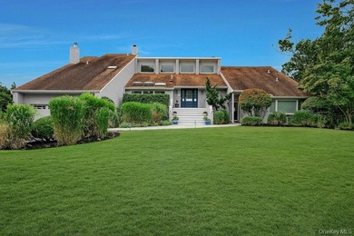 Welcome to an exceptional waterfront estate set along the - photo 1