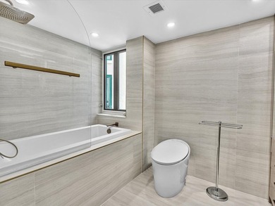 Welcome to luxury waterfront living in downtown Boca. This - photo 15