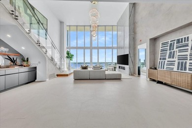 A TRUE MASTERPIECE! Fully Renovated 2 Story Penthouse with over