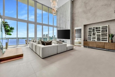 A TRUE MASTERPIECE! Fully Renovated 2 Story Penthouse with over