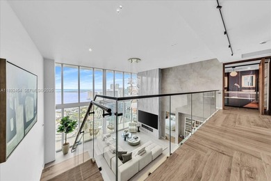 A TRUE MASTERPIECE! Fully Renovated 2 Story Penthouse with over
