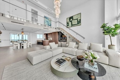 A TRUE MASTERPIECE! Fully Renovated 2 Story Penthouse with over