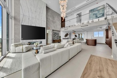 A TRUE MASTERPIECE! Fully Renovated 2 Story Penthouse with over