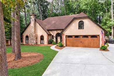 Welcome to this charming European-style home tucked away on a - photo 1