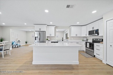 Brand New Roof! Welcome home to this beautifully renovated pool - photo 16