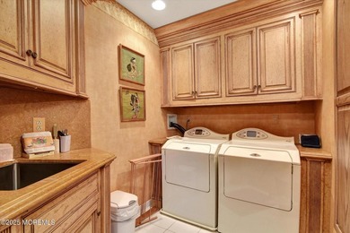 RARE OPPORTUNITY FOR A BEAUTIFUL CUSTOM RIVERFRONT HOME ON A ONE - photo 50