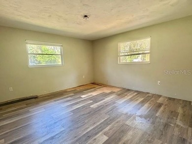 Welcome to this charming 3-bedroom, 2-bathroom pool home located - photo 11