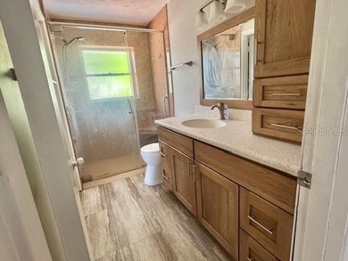 Welcome to this charming 3-bedroom, 2-bathroom pool home located - photo 12