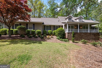 Nestled on a private 2.39-acre lot, this beautifully maintained - photo 2