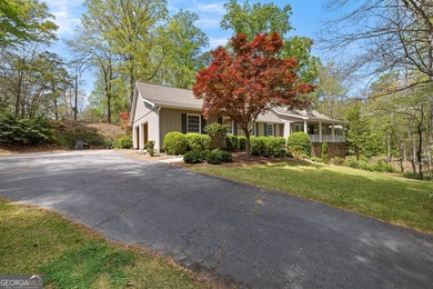 Nestled on a private 2.39-acre lot, this beautifully maintained - photo 3