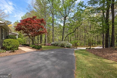 Nestled on a private 2.39-acre lot, this beautifully maintained - photo 4
