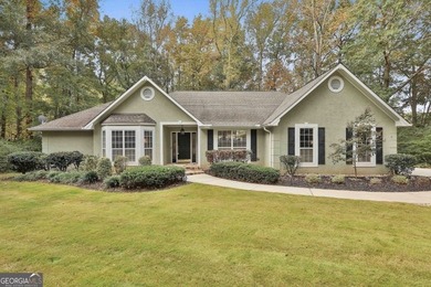 Nestled on a private cul-de-sac lot with beautiful wooded and - photo 1