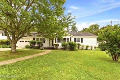 Charming 3 bedroom, 2 bath cottage-style home situated on a