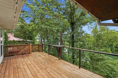 Wake to sweeping Greers Ferry Lake views from this peaceful - photo 43