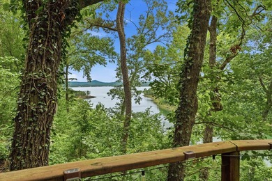 Wake to sweeping Greers Ferry Lake views from this peaceful - photo 44