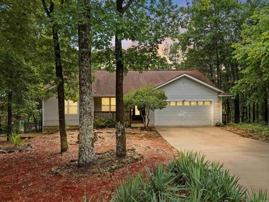Wake to sweeping Greers Ferry Lake views from this peaceful - photo 46