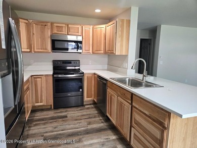 This fully remodeled 2-bedroom, 1.5-bath condo offers riverside - photo 3