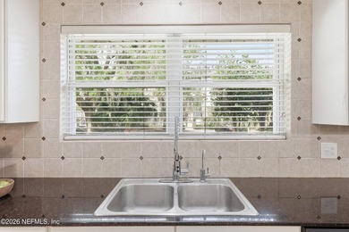Location, updates, and timeless charm! This beautifully - photo 12