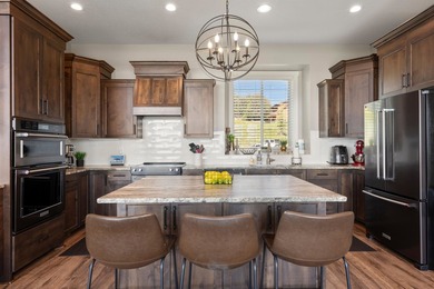 Welcome to 68 Hawksbeard Circle, a remarkable 8-bedroom, 5 - photo 13