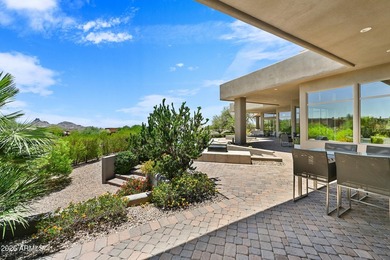Positioned on a premium 1.3-acre lot within Talus, the - photo 27