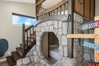 Welcome to 68 Hawksbeard Circle, a remarkable 8-bedroom, 5 - photo 27