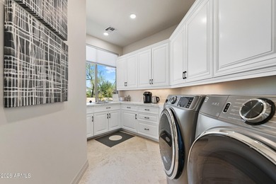 Positioned on a premium 1.3-acre lot within Talus, the - photo 32