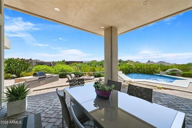 Positioned on a premium 1.3-acre lot within Talus, the - photo 34