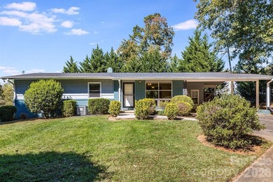 Imagine returning home in sought-after North Asheville. A - photo 1