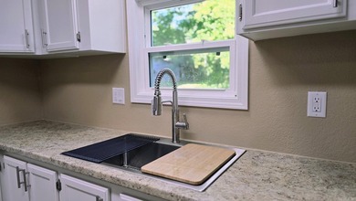 THIS IS BASICALLY A BRAND NEW HOME!! New subfloors, new - photo 11