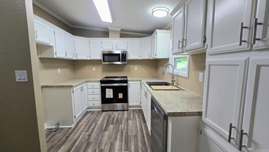 THIS IS BASICALLY A BRAND NEW HOME!! New subfloors, new - photo 12