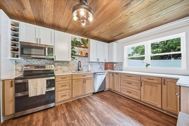 Experience the perfect blend of waterfront living, versatility - photo 16