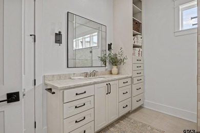 Tucked away behind a winding drive, this custom-built 2023 - photo 20