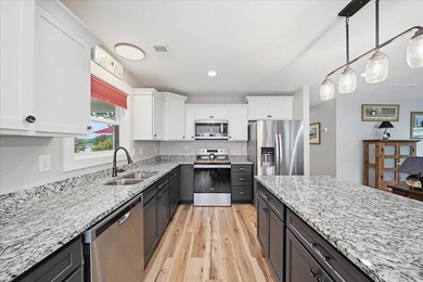 Experience the perfect blend of waterfront living, versatility - photo 43